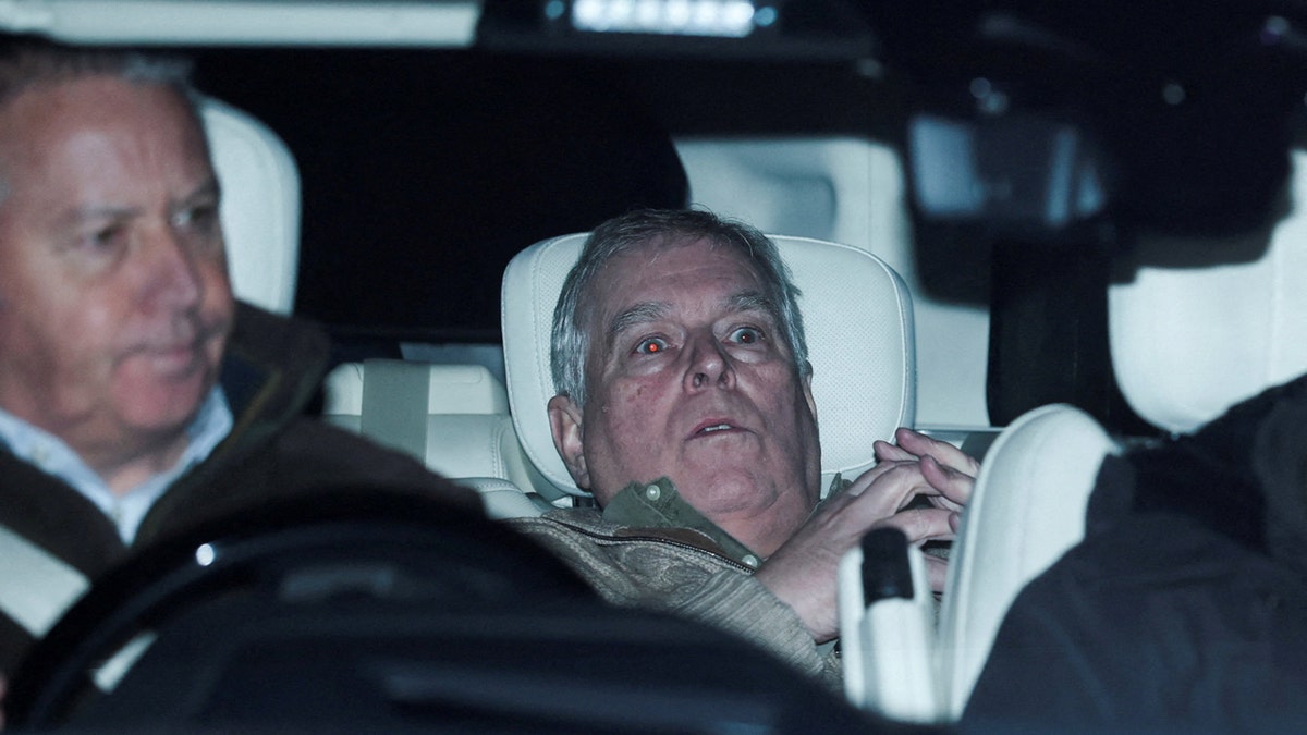 Prince Andrew photographed in the back of a car