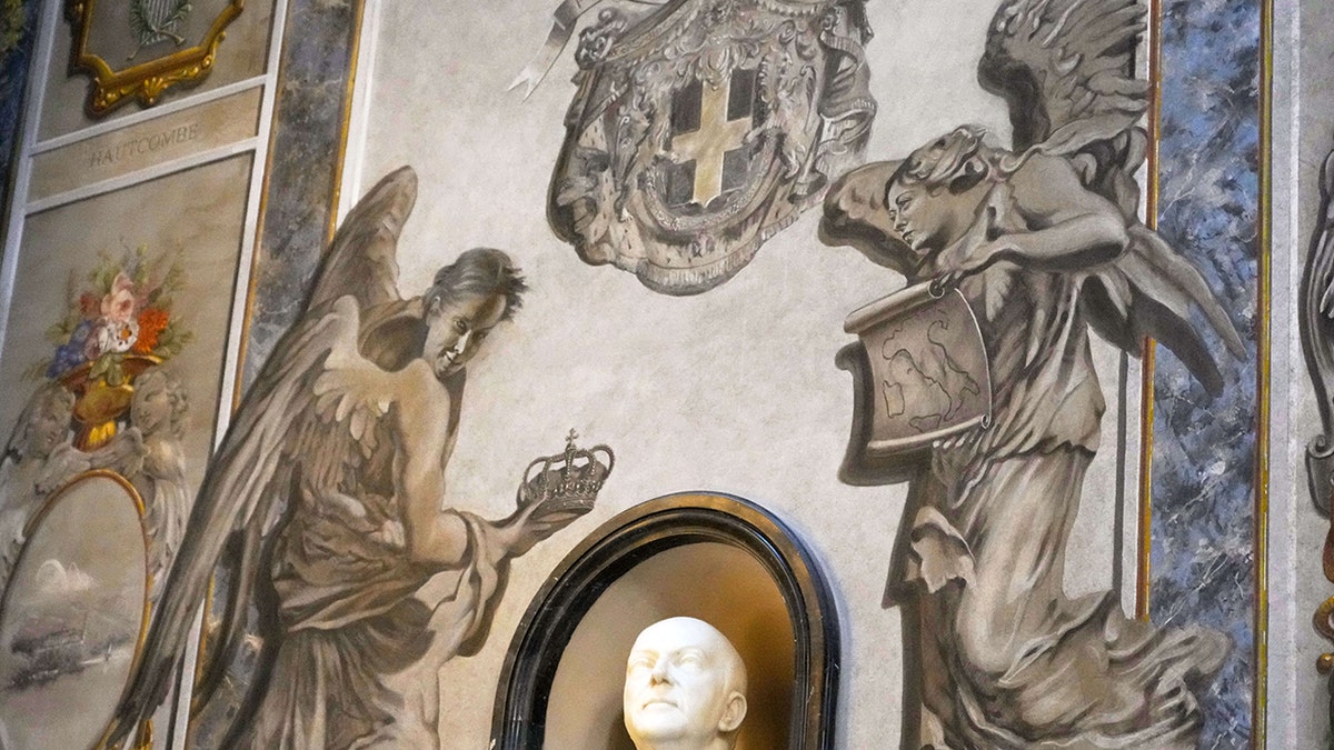 Mysterious cherub face pops up at sacred tourist site as officials launch investigation at george magazine