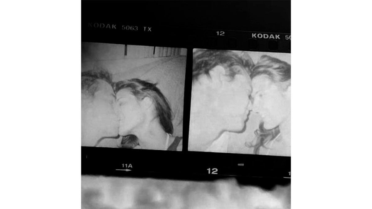 Angie Harmon and new boyfriend Tony Floyd share a kiss