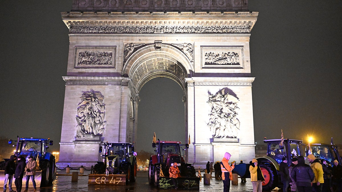 the Arc de Triomphe with police around it