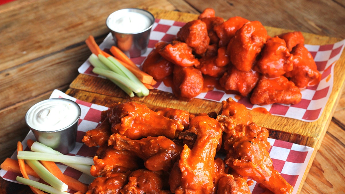 Boneless wings next to chicken wings