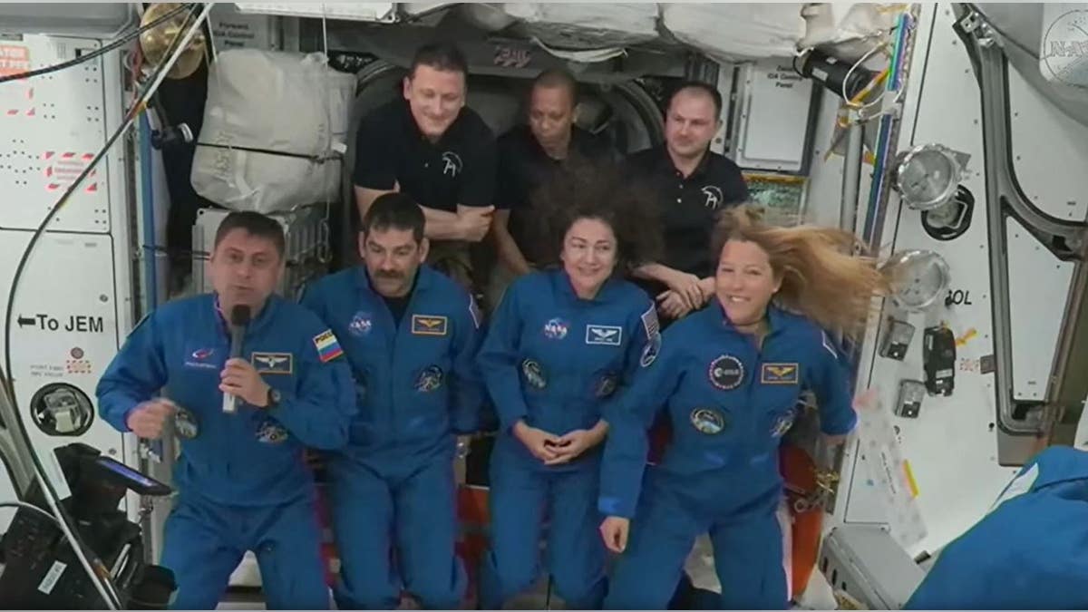 Astronauts speaking after arriving at ISS