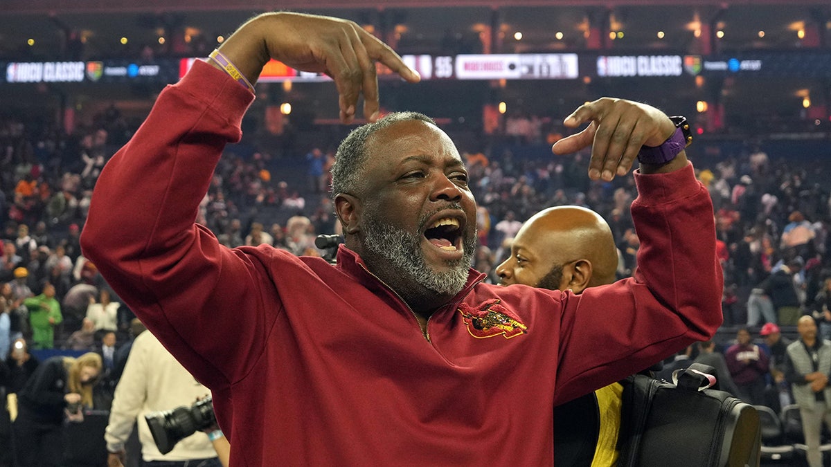 Tuskegee University basketball coach handcuffed on court during post-game incident at Morehouse College at george magazine