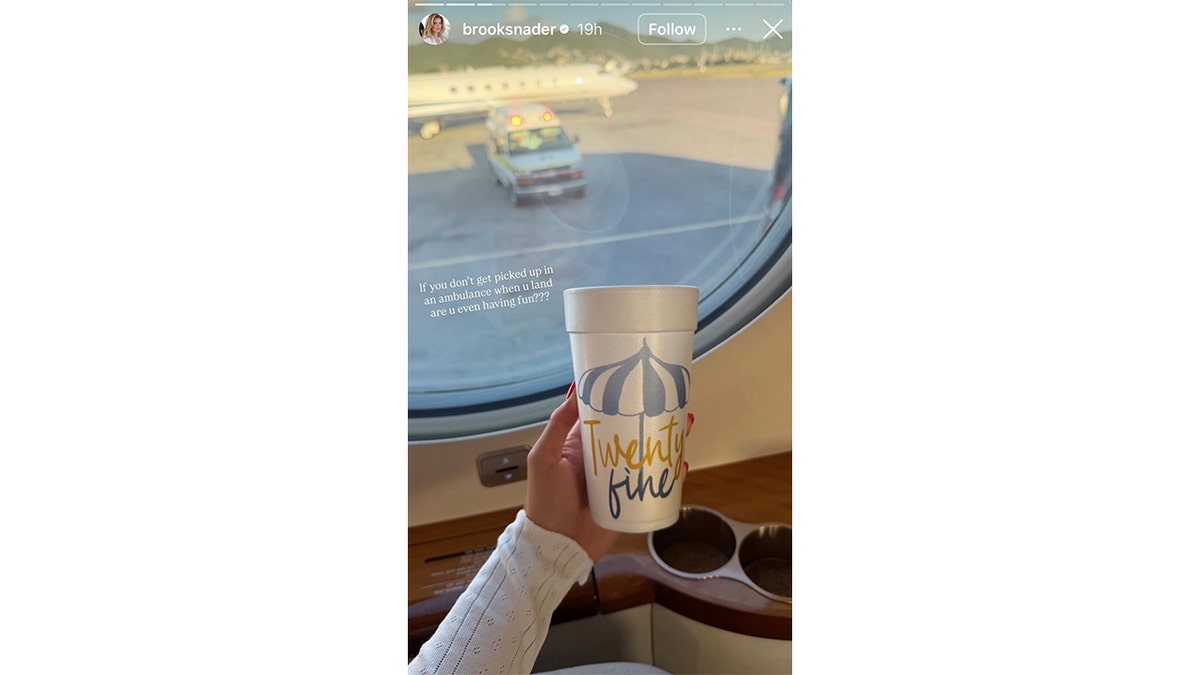 Brooks Nader posts a photo of the airplane window