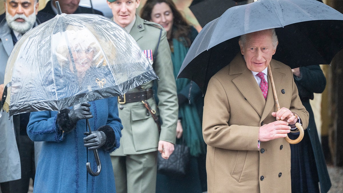 King Charles III and Queen Camilla walking with umbrellas