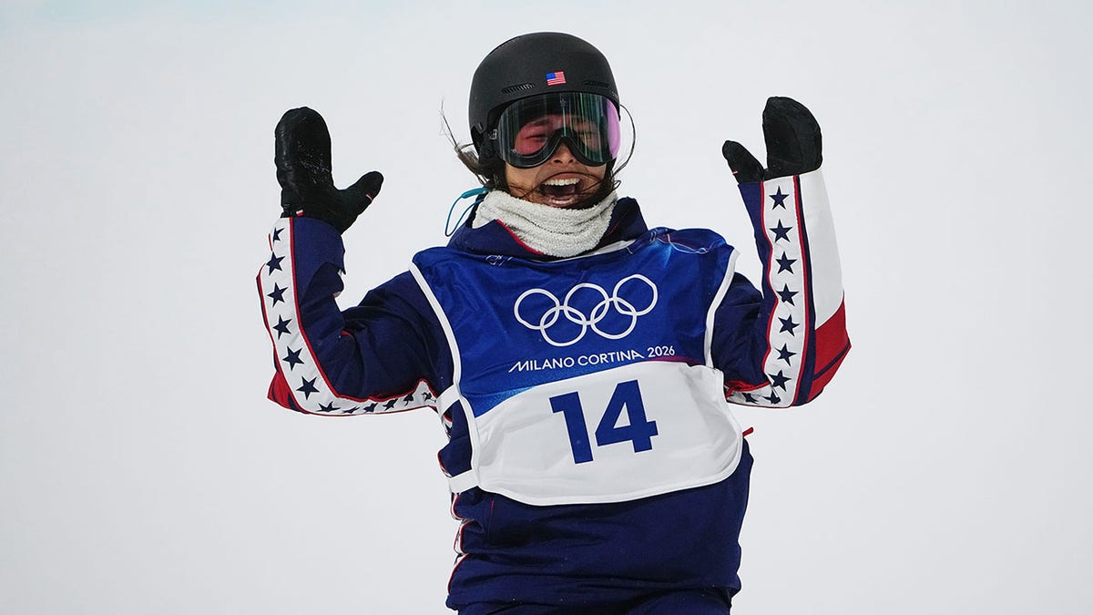 Chloe Kim reacts after snowboard run
