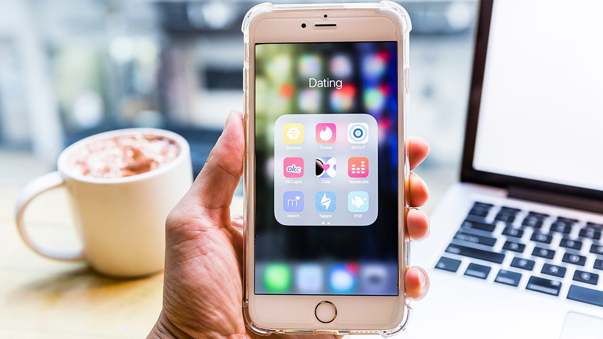 Man on the dating folder on his phone.