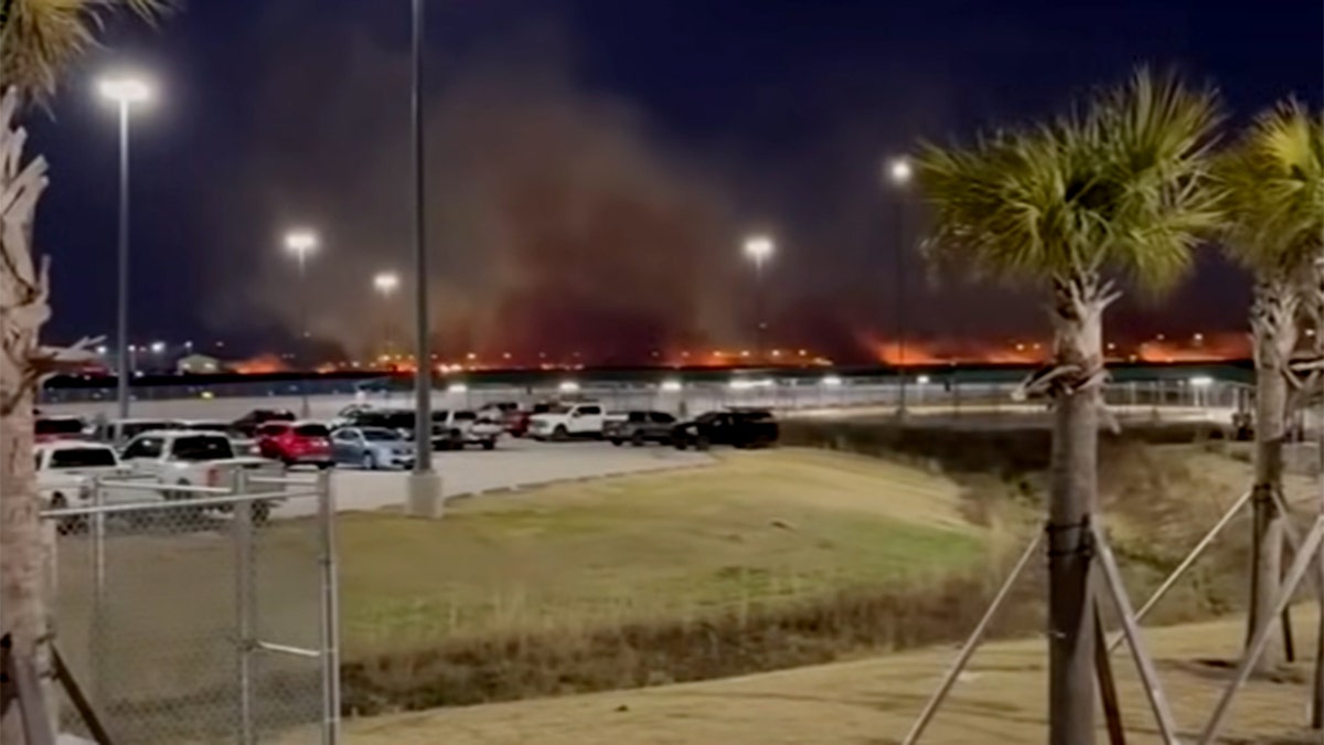 Large brush fire burning at Savannah airport due to Delta engine failture.