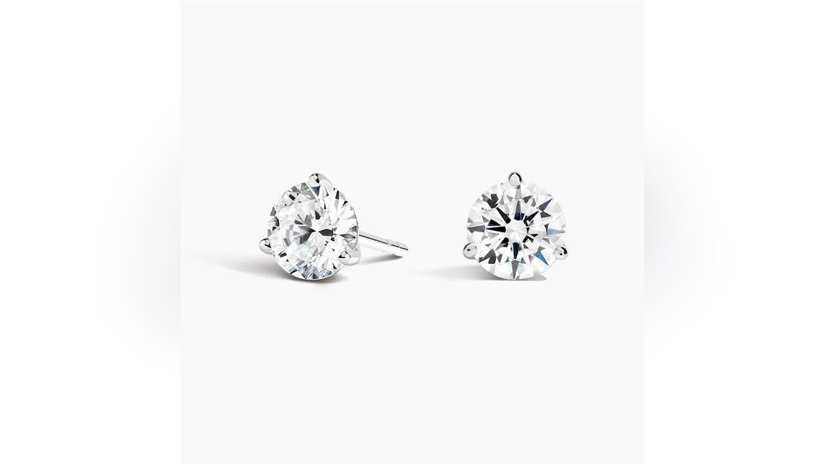 Three-prong martini studs designed to sit close to the ear.