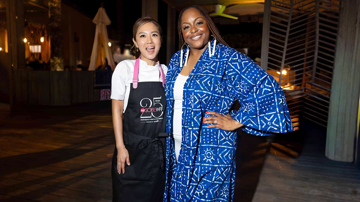 Esther Choi and Kardea Brown pose for a photograph at the 2026 South Beach Wine & Food Festival.