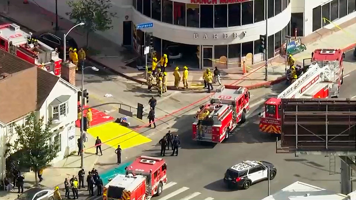Multiple dead, several injured after vehicle crashes into Los Angeles grocery store at george magazine