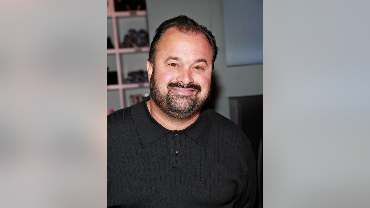 A close-up of Frank Fritz wearing a black shirt.