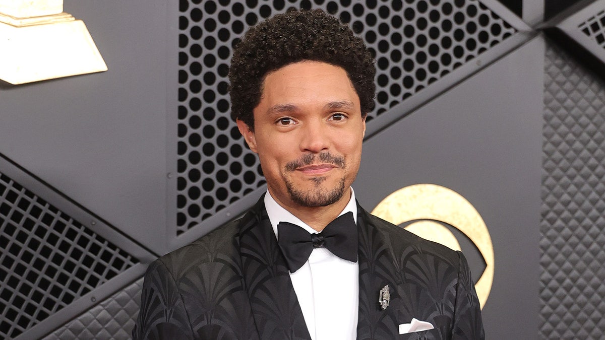 Trevor Noah walks red carpet at 68th Grammys