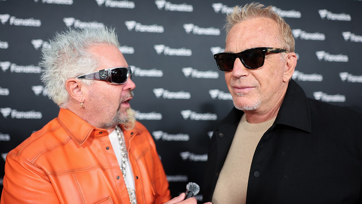 Guy Fieri and Kevin Costner at the Fanatics party ahead of the Super Bowl in February 2026.
