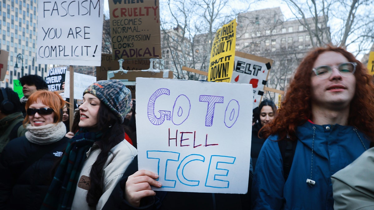People protesting with signs