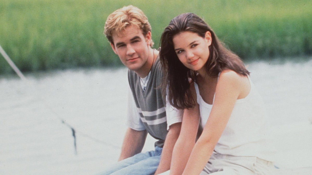 James Van Der Beek and Katie Holmes pose together during the early years of Dawson’s Creek in 1998.