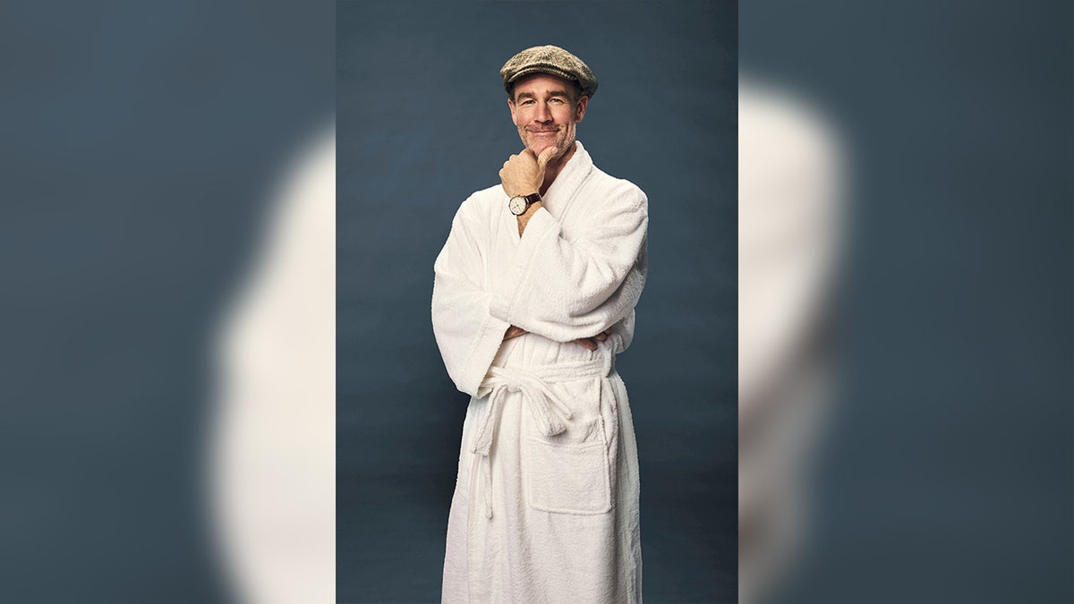 James Van Der Beek wears robe and hat