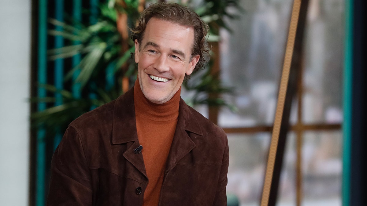 James Van Der Beek smiling while on "The View" in December 2024.