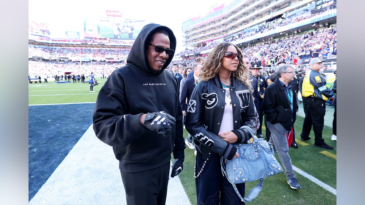 Jay-Z and his daughter at the Super Bowl.