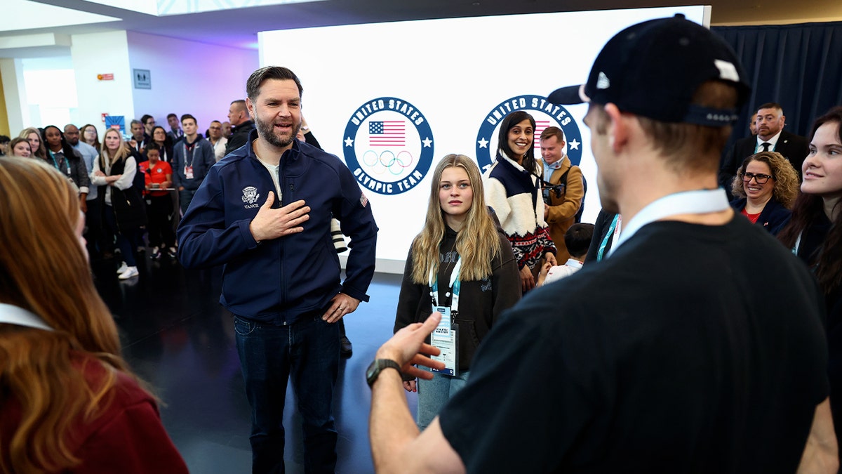 Vance speaks with athletes in Italy