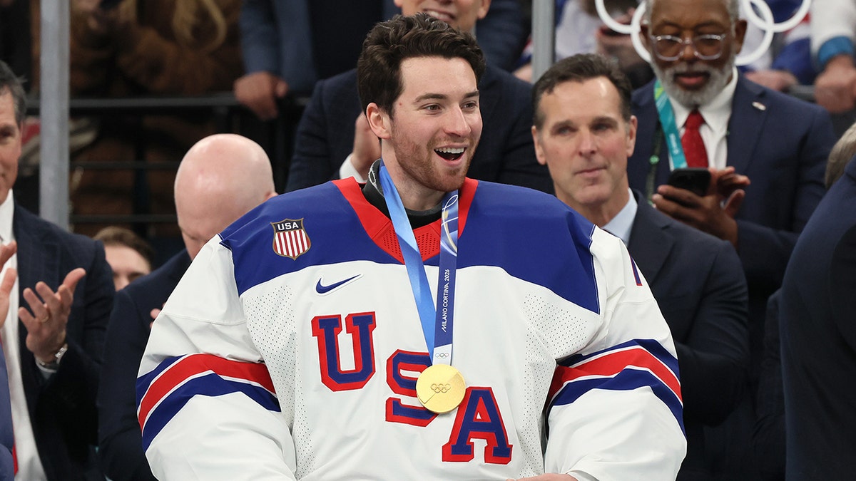Jeremy Swayman with gold medal