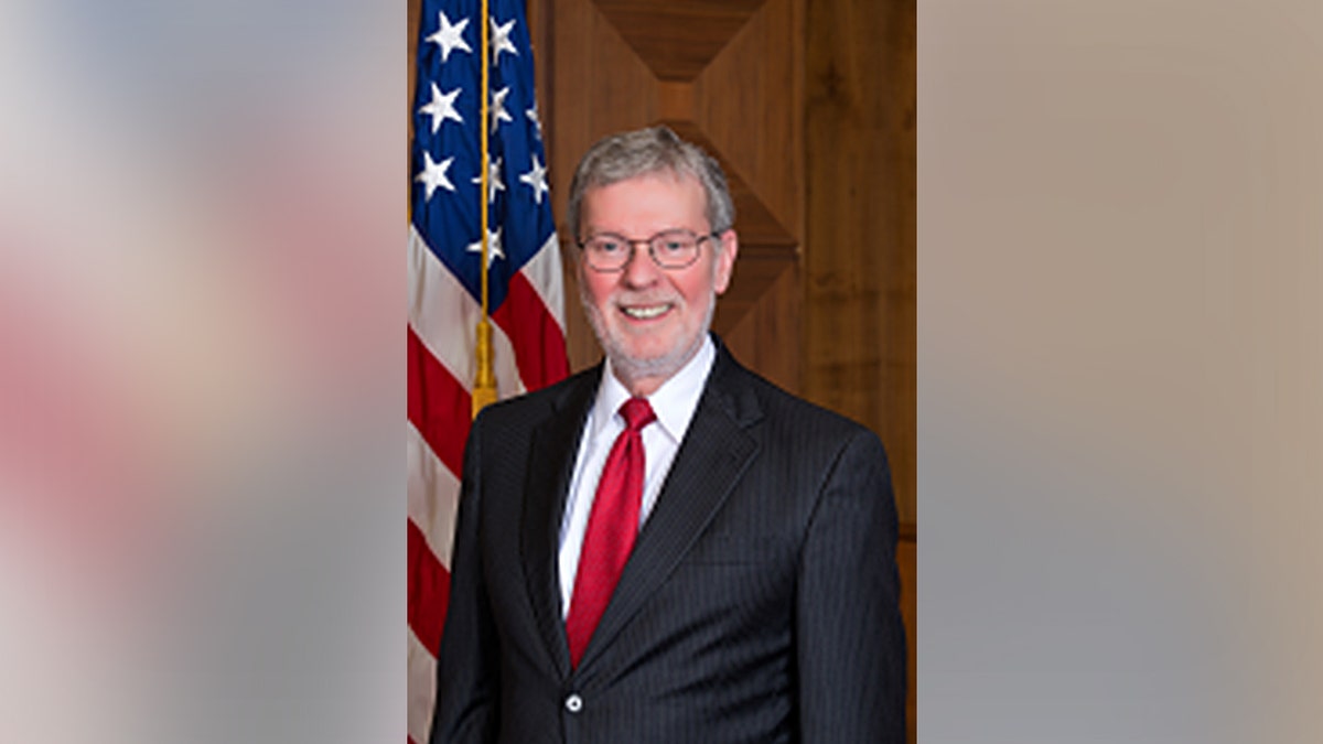 Headshot of Judge John W. deGravalles