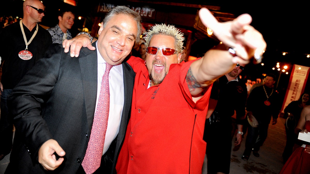 Lee Brian Schrager and Guy Fieri are photographed together during the 2009 South Beach Wine & Food Festival.