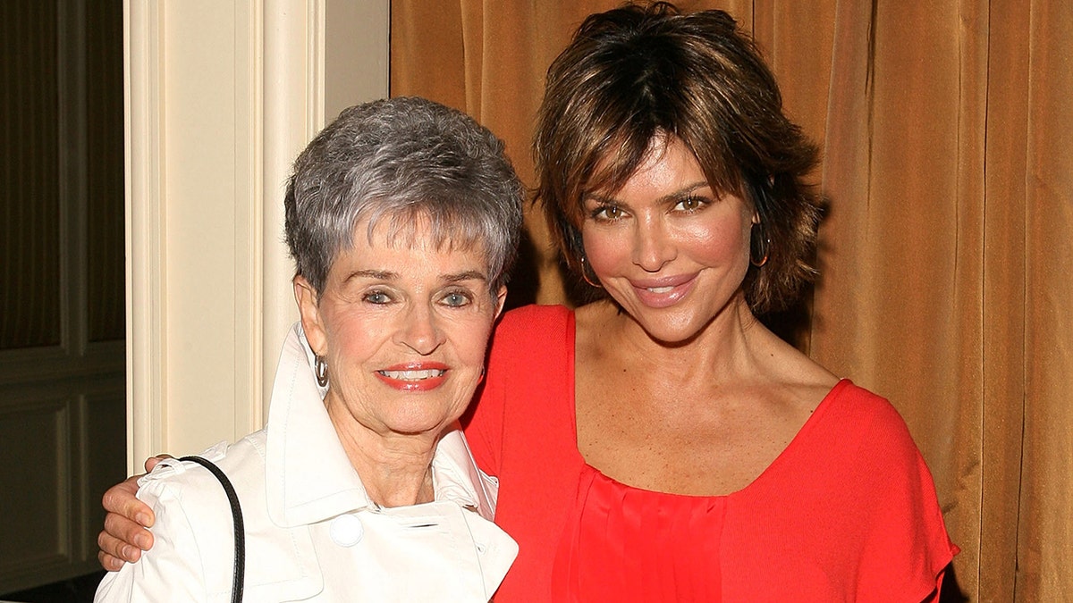 Lois Rinna and her daughter Lisa Rinna smiling and posing together.