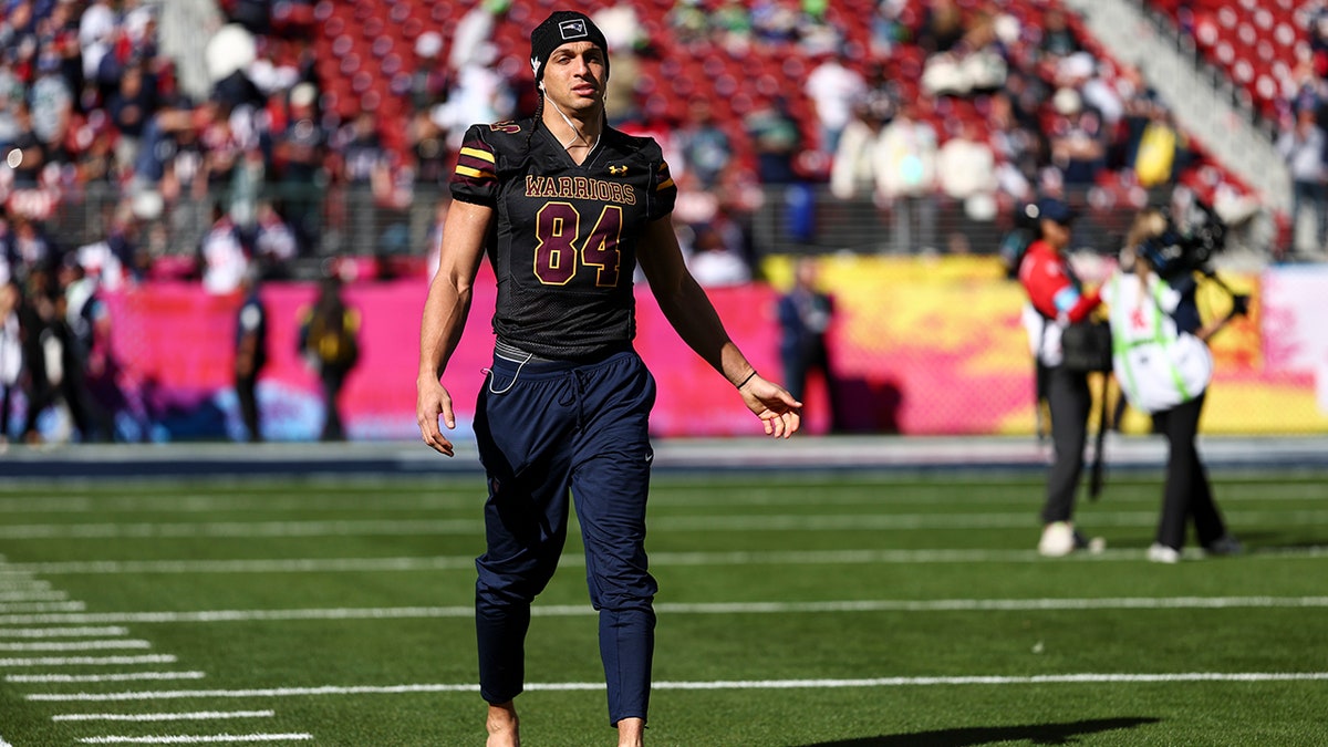 Mack Hollins warms up before a game