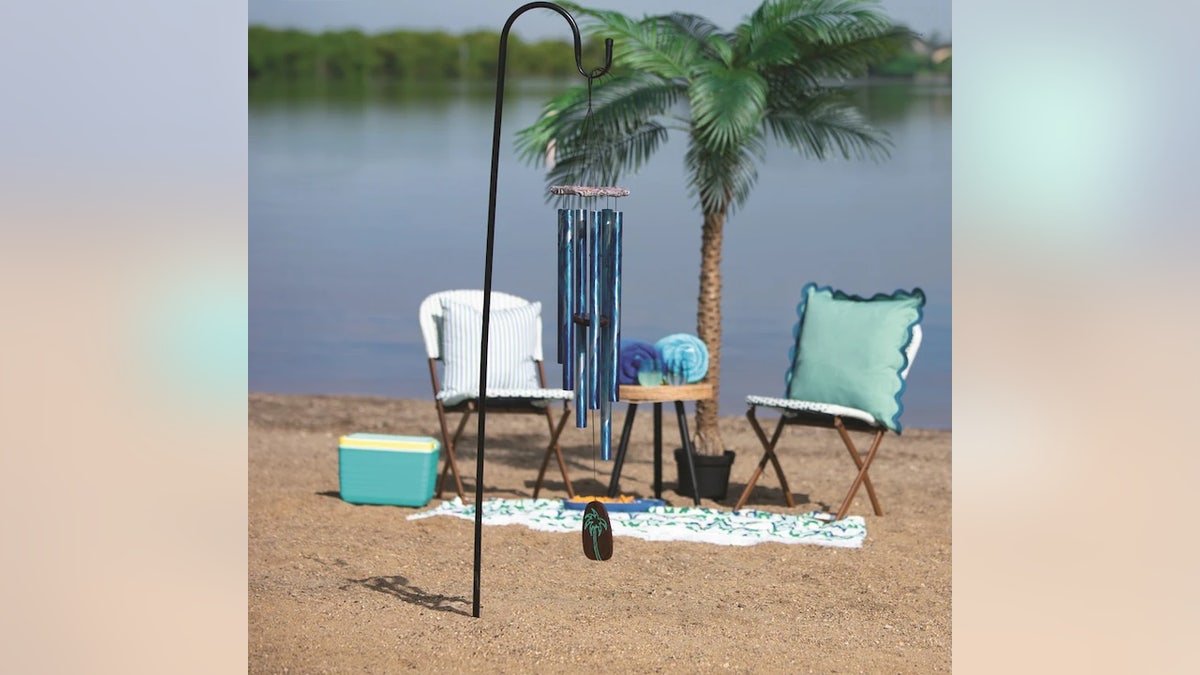 A stylish, island-style chime set painted with ocean views.