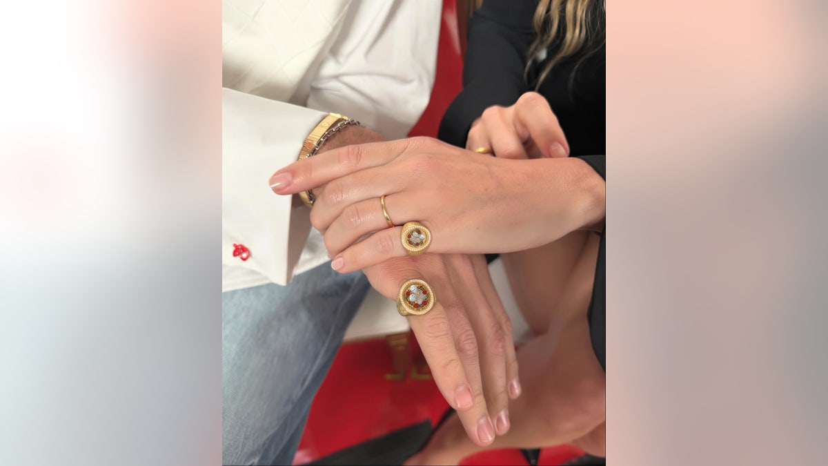 Jacob Elordi and Margot Robbie wearing rings