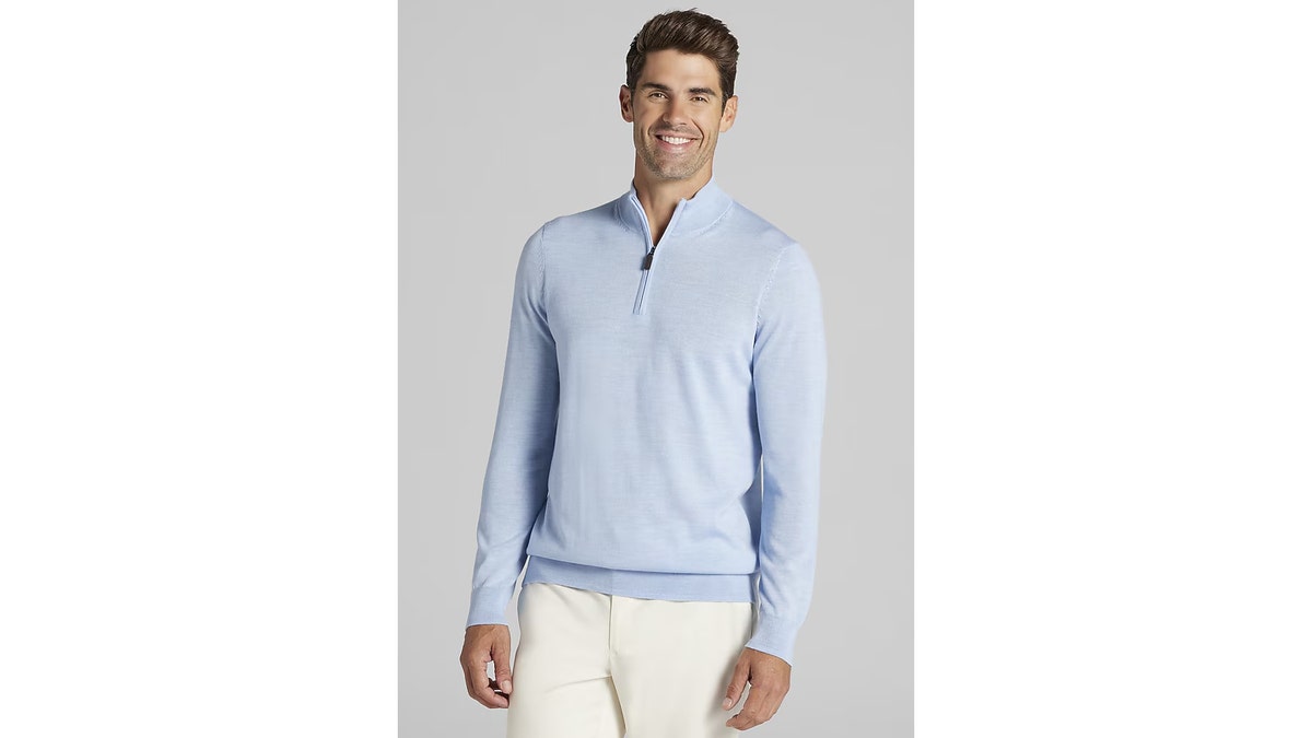 Wear this lightweight merino-blend quarter-zip alone or under jackets.