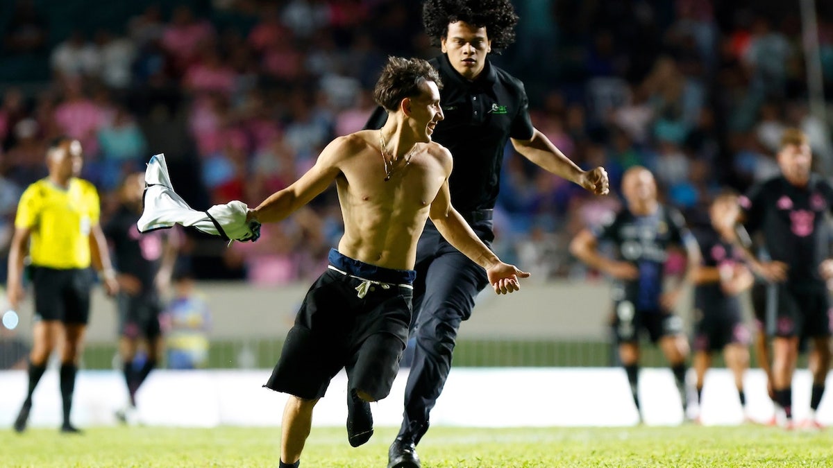 Lionel Messi tackled to the ground during game after his famed bodyguard was not allowed on sidelines
