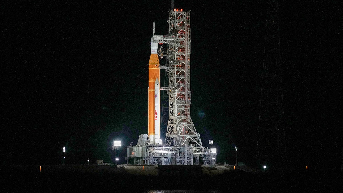 NASA Artemis II SLS (Space Launch System) rocket connected motorboat pad