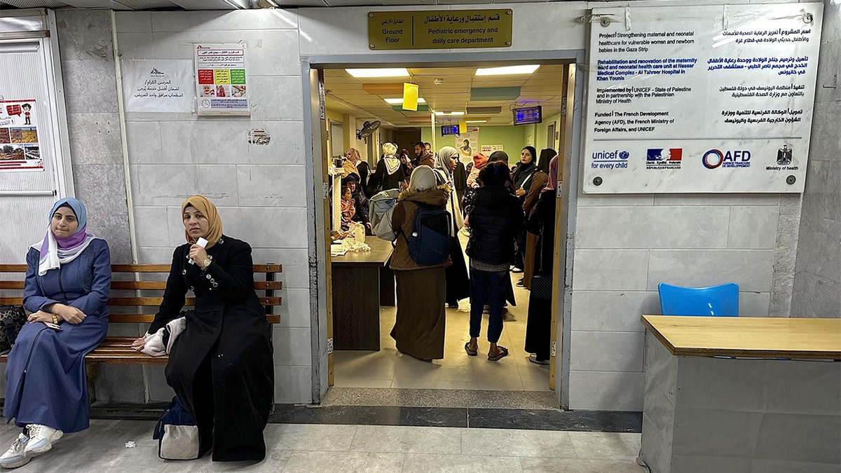 Young patients are treated in a hospital ward as seasonal illnesses spread among displaced families living in harsh winter conditions.