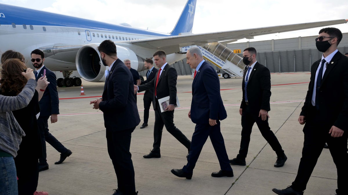 Israeli Prime Minister Benjamin Netanyahu boards his plane 