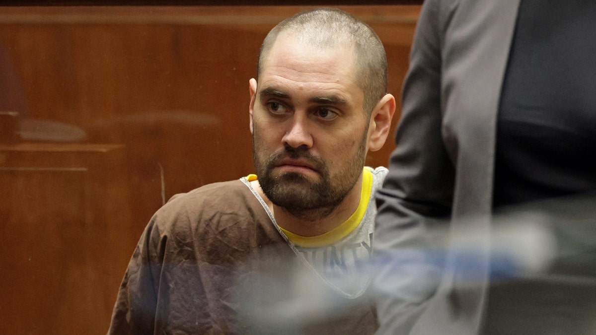 Nick Reiner beside Kimberly Greene in a Los Angeles County Superior Court room.