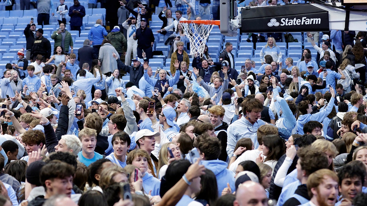 UNC fans storm the court