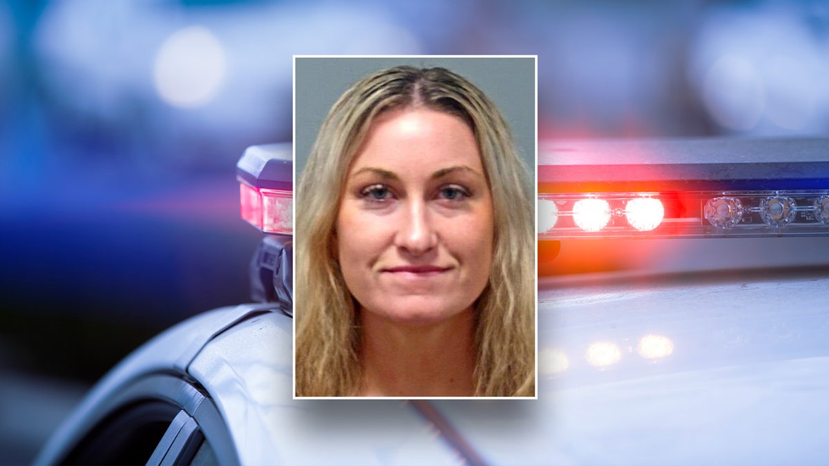 OLIVIA CLENDENIN MUGSHOT AGAINST POLICE CRUISER