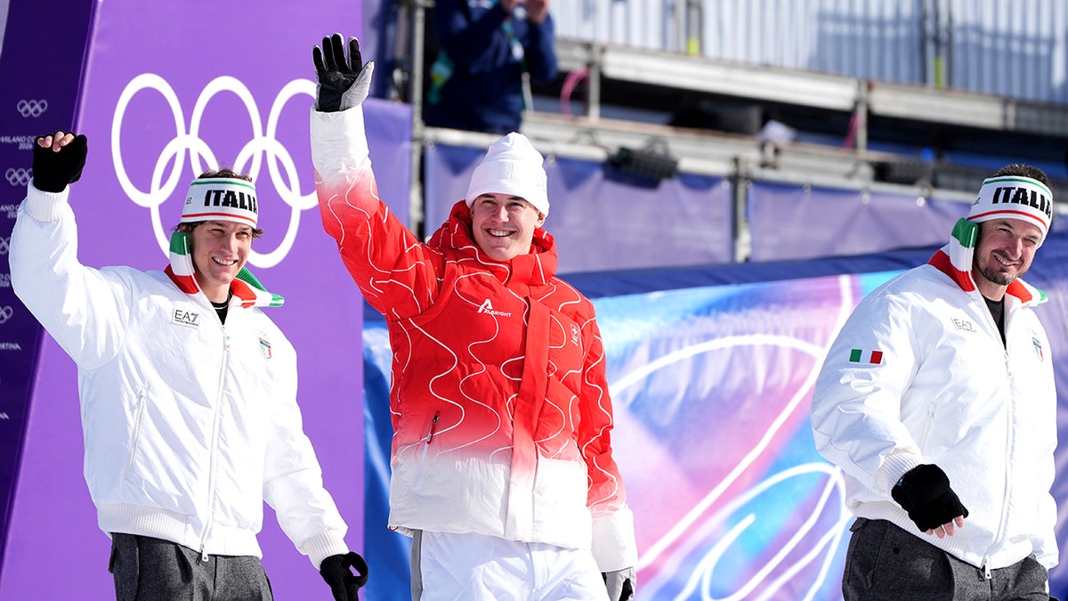 Franjo von Allmen waves from olympic podium