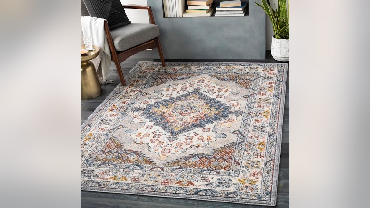 This large, stain-resistant rug anchors your space.