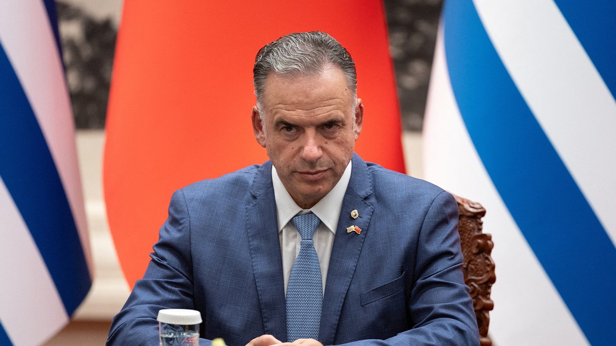 Uruguayan President Yamandu Orsi looks on during a signing ceremony with Chinese President Xi Jinping (not pictured) at the Great Hall of the People in Beijing, China, February 3, 2026.