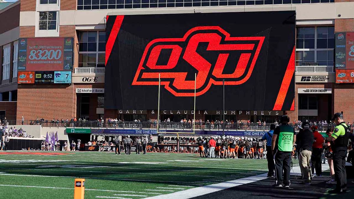 Oklahoma State logo on field