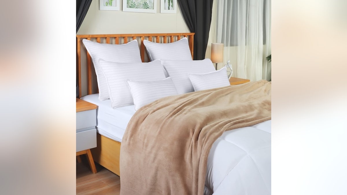 This two-pack of pillows offers neck cradling support.