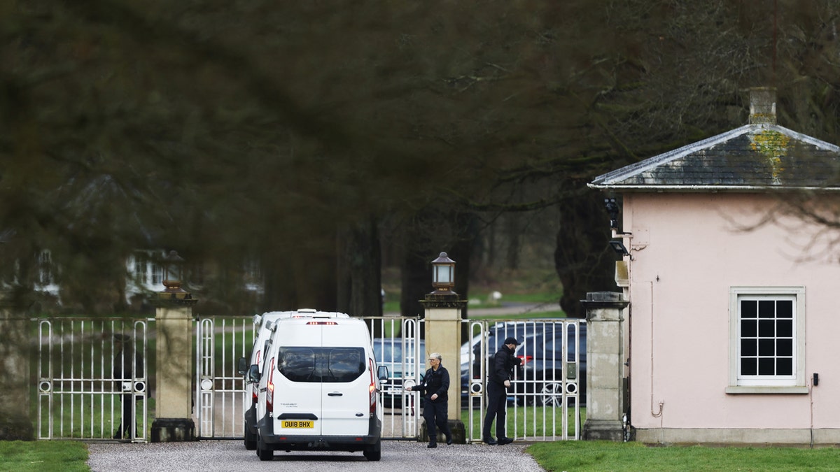 Vehicles arriving at the entrance of Royal Lodge in Windsor, Berkshire.