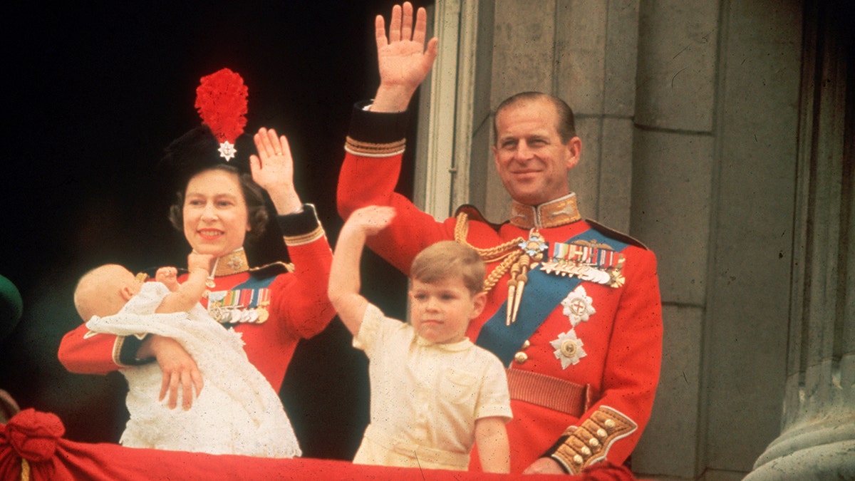 Prince Andrew on the Buckingham Palace balcony with Queen Elizabeth, Prince Philip and Prince Edward in 1964.