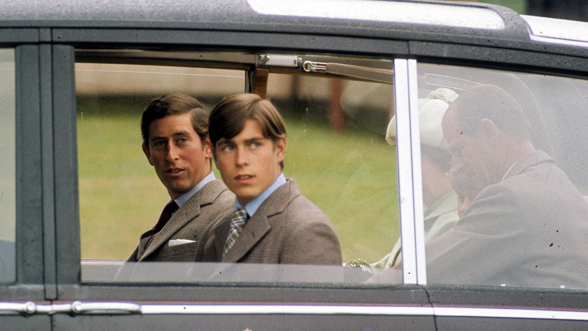 Prince Andrew and King Charles in a Rolls Royce at the Highland Games in Scotland in 1975.