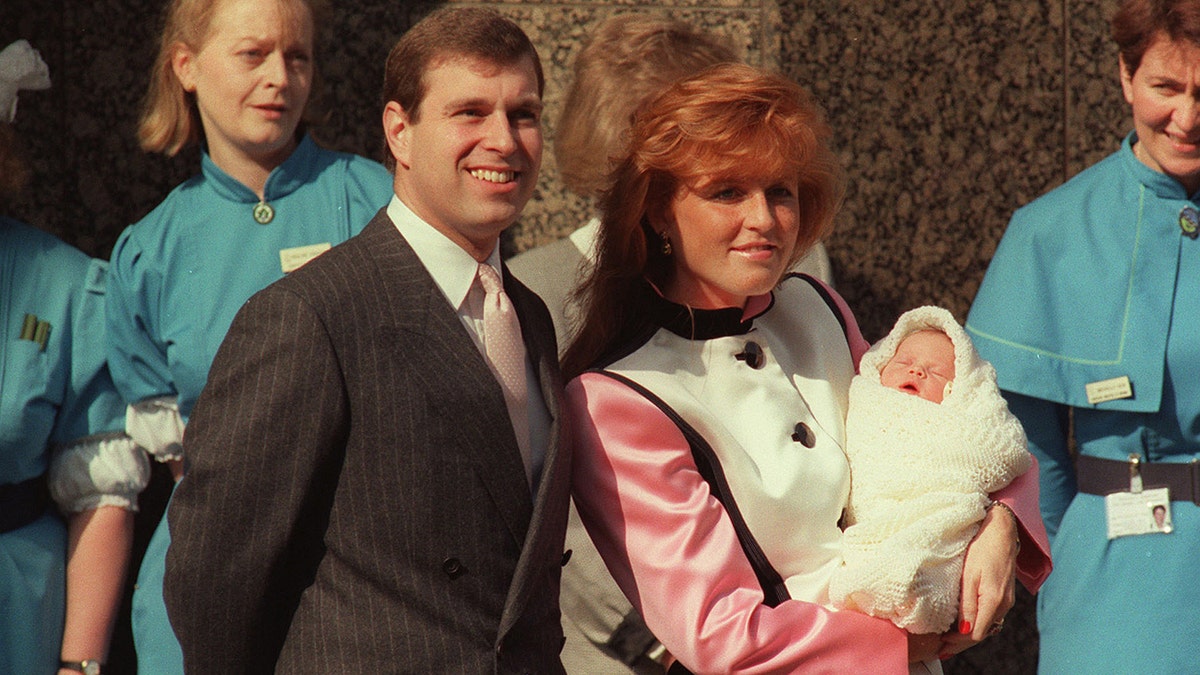 Prince Andrew and Sarah Ferguson outside the hospital with their newborn baby Princess Eugenie in 1990.