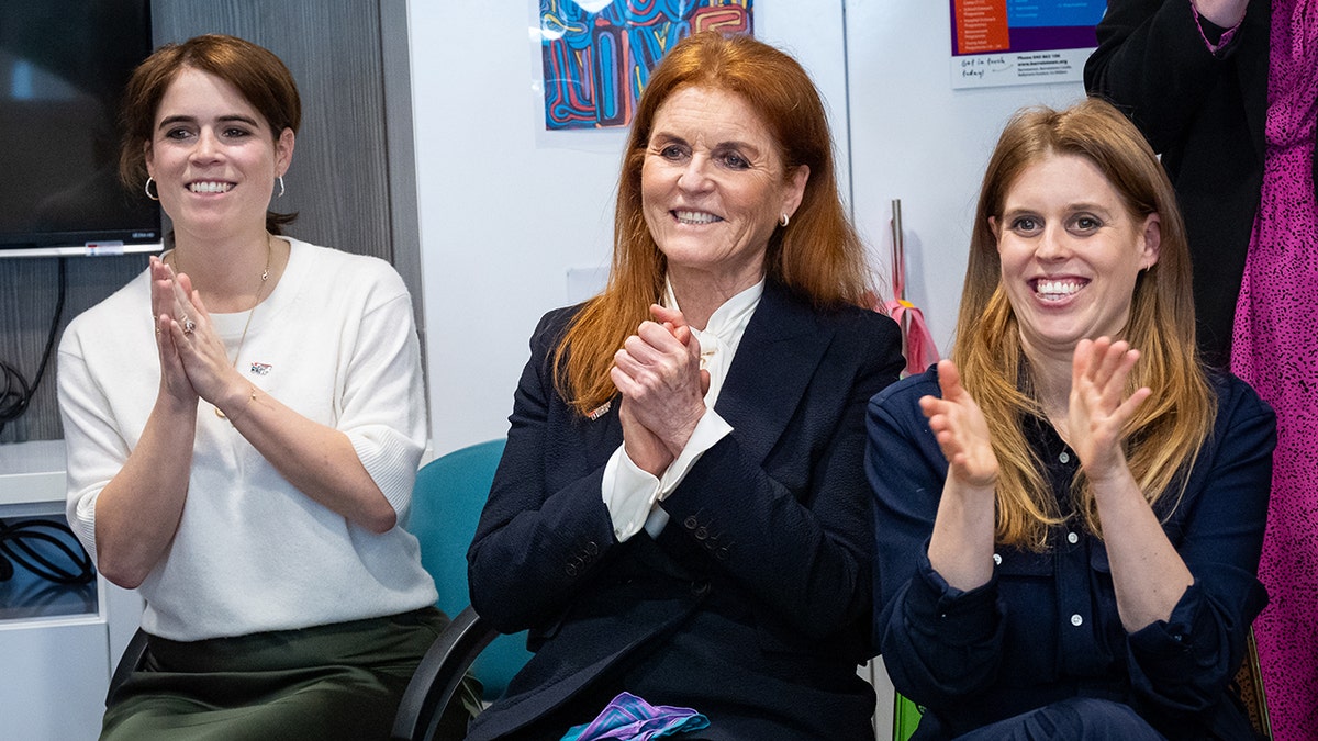 The York sisters with their mother, Sarah Ferguson, smiling and sitting together during a royal engagement in the U.K.
