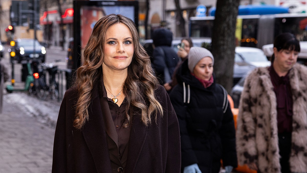 Princess Sofia of Sweden looking at a camera while bundled up outside in Sweden.